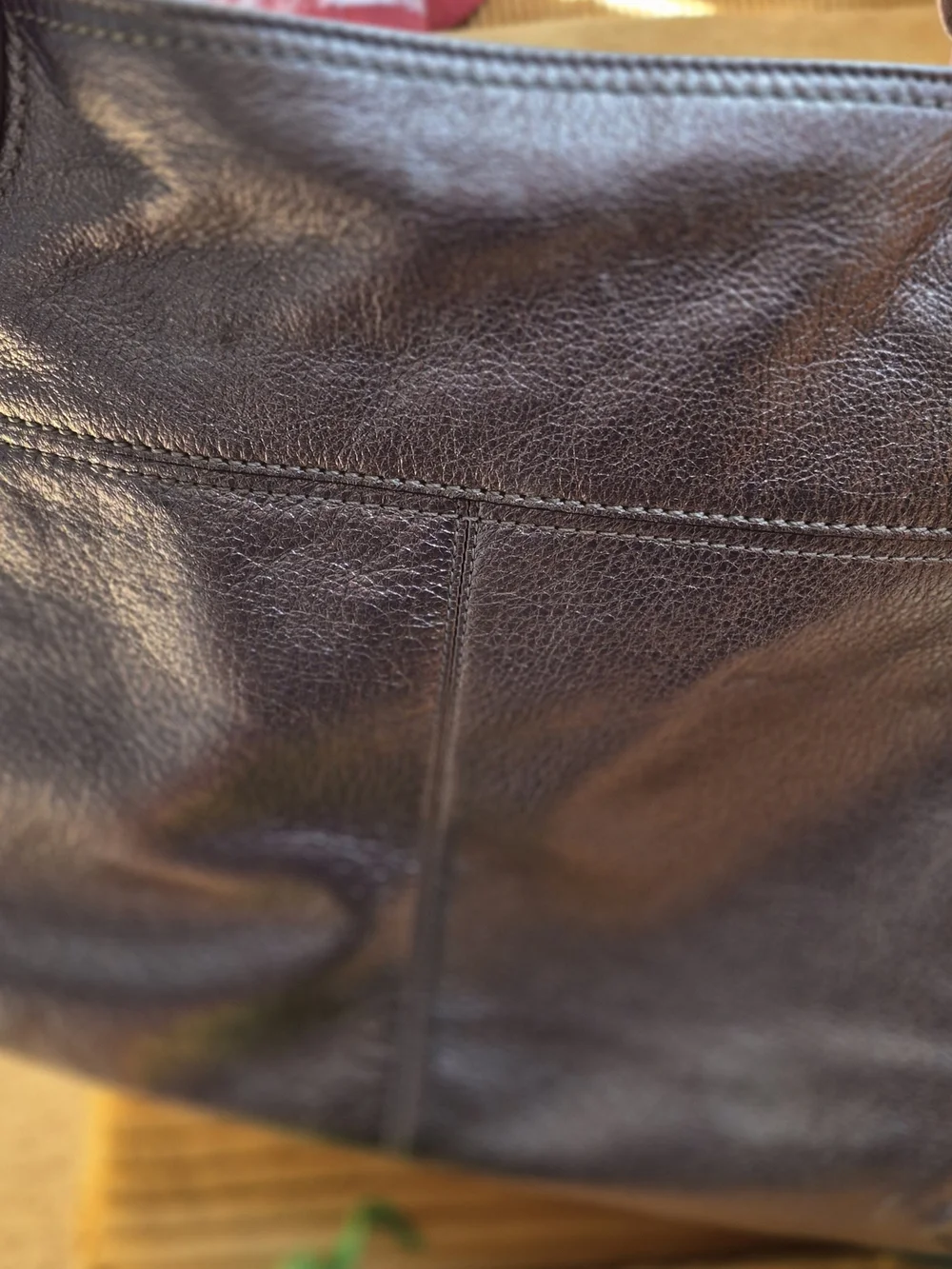 Coach sleek metallic